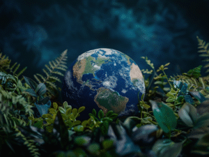 Planète Terre entourée de plantes vertes symbolisant la nature et la durabilité environnementale